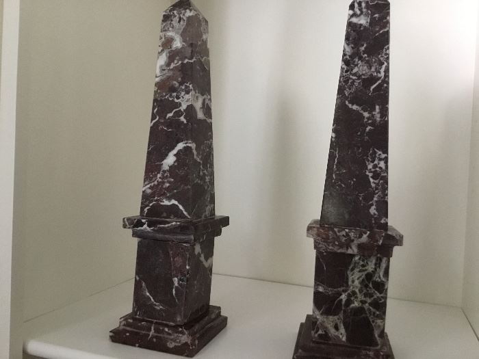 Pair of large marble obelisks.