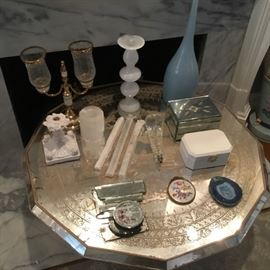 Mirrored circular coffee table, crystals, and much more.