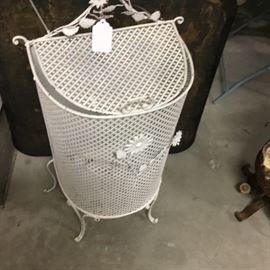 Clothes hamper or waste basket.  Your choice.