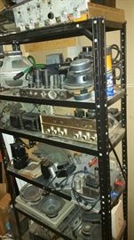 Rack of tube amps including Bogen and Hammond