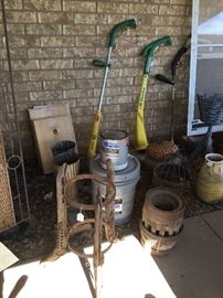 Plant stands, 6 gals. White house paint, 3 electric weedeaters, wagon wheel stand