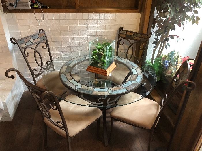 Beautiful glass top with iron chairs