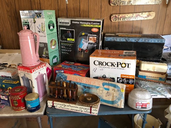 New crock pot, iron horseshoe set complete, new roasting pan, Shiatsu massaging cushion new, pipe collection