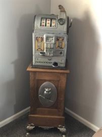 1922 nickel slot machine on wood stand