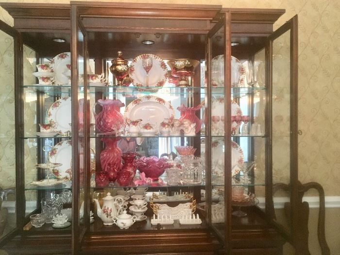  A china cabinet filled with Royal Albert, beautiful crystal, and other pretty pieces 