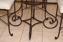 Arhaus glass table with cast iron legs (Detail) - 29" Height.