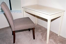 White painted table with chair. Table - 43.5" Length x 22" Width x 20" Depth. Chair - 55.5" Height x 20" Width.