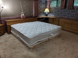 This King size mattress is a factory second. There are no stains or rips. It is a padded top on both sides. You can see the bent end that is the default only on one side. The 2 single box springs are older but do support the mattress.