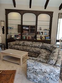 Very large book display shelf. Large wrap around sofa from the sofa and chair co.