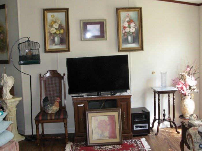 Floral oil painting, TV, and other household accessories