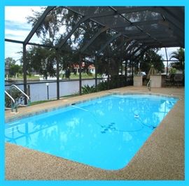 This Fabulous 4 Bedroom, 2 1/2 Bath, Waterfront Pool Home will be FOR SALE SOON!! Come on out this Thursday and see it before it goes on the market. Showing the Gorgeous Spacious Lanai with Large Pool and Outdoor Kitchen and Bar. This Home is located in one of the very few areas in Punta Gorda Isles that does not have houses across the street.