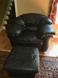 Deep blue leather chair and ottoman