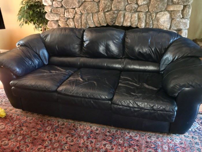 Deep blue leather sofa