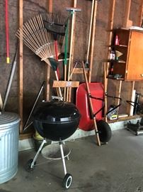 Garage items including wheel barrels, grill, Shovels, Ladders, Rakes etc...