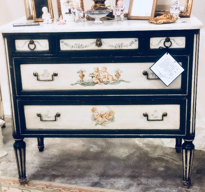 Italian painted in the original condition commode- circa 1890. Original brass pulls, mounted with beveled Antique Carrara Marble. 37 1/4” H x 41 1/2” W x 21 1/2” D.
