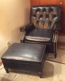 Black vinyl club chair & ottoman with nail head trim