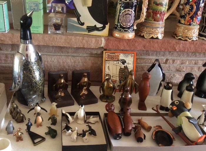 Did we mention the penguins? Highlights: tall musical decanter, metal book ends, mama penguin with 6 babies on a chain, carved wooden penguins