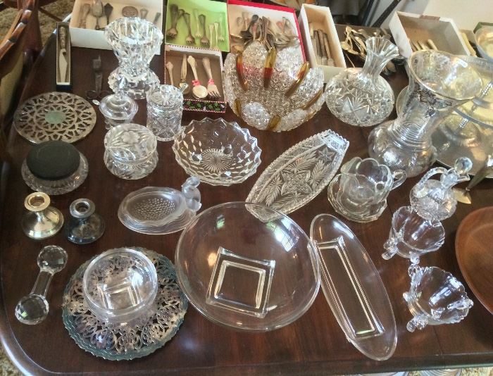 Glass bowls & serving pieces, silverplate trivets, silver overlay vase & more 