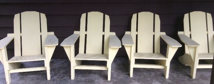 4 pale yellow Adirondack chairs