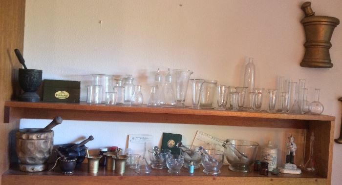 Still more pharmacy: glass & wood mortar & pestles, beakers, apothecary jars