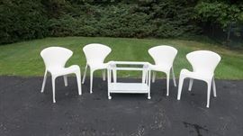 Modern outdoor/patio chairs from Design Within Reach and serving cart on wheels