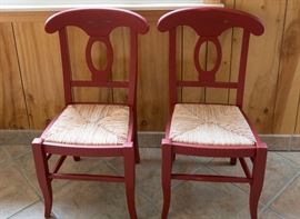 Pair of child-size chairs with cane seats