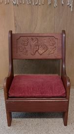 Child-Size wood chair with carved horse head decoration