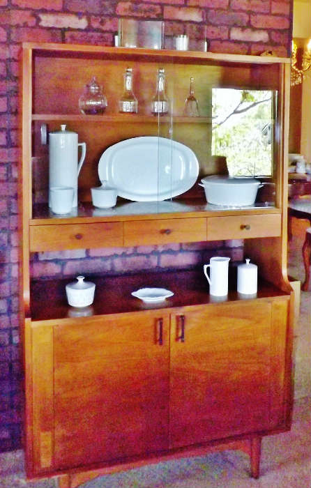 A mid-century Kroehler Danish Modern hutch, Centura by Corning Ware serving pieces.