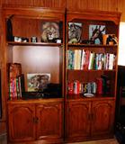 Bookcases, cameras, books, binoculars