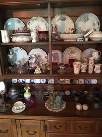Hutch full of antique glass & china. Butter pat collection