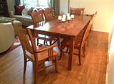 Mission style oak dining table and chairs. This is a truly beautiful set.