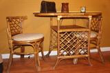 Adorable Vintage Rattan Dinette set. Chairs fit under table.