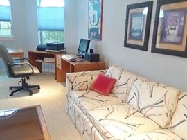 The upstairs office. 96" sofa, teak furniture