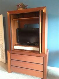 Great "with it" entertainment center, bar, or linen storage!