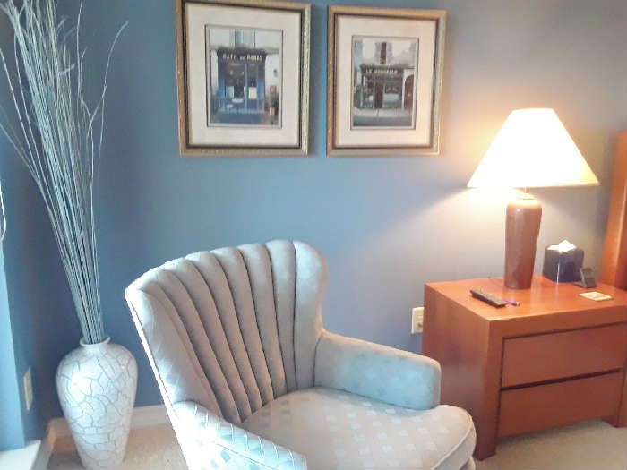 Another view of pair of baby blue chairs and side tables.