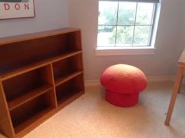 Whimsical mushroom shaped stool. Yeppers - bright orange.