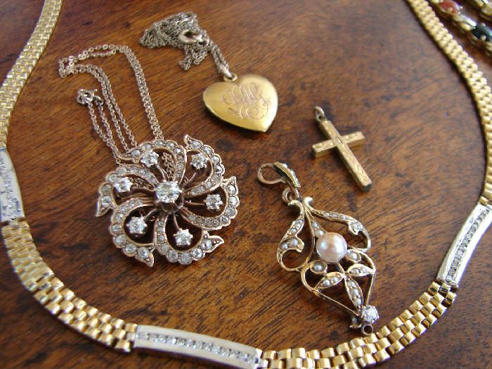 Vintage jewelry and contemporary 14k and diamond necklace.