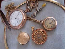Vintage pocket watches and pendants.