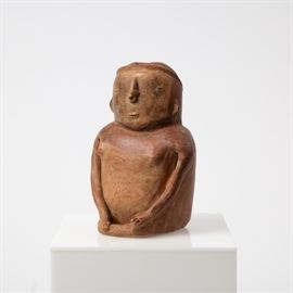 A QUIMBAYA CAUCA SEATED POTTERY FIGURE