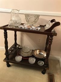 Tea cart with various crystal and glassware