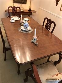 Dining table, 2 arm chairs and 2 side chairs