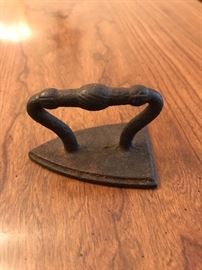 Small cast iron iron