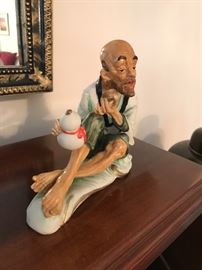 Asian man figurine