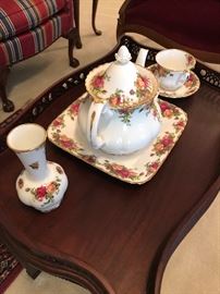 Royal Albert Old Country Rose:  Tea pot on a plate; vase; and cup with saucer