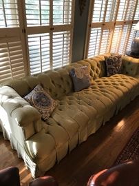 Tufted upholstered sofa
