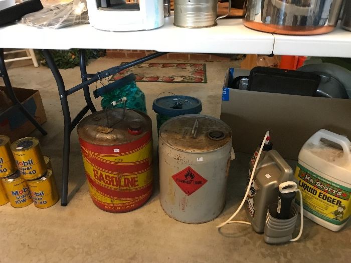 Vintage gasoline cans and chemicals