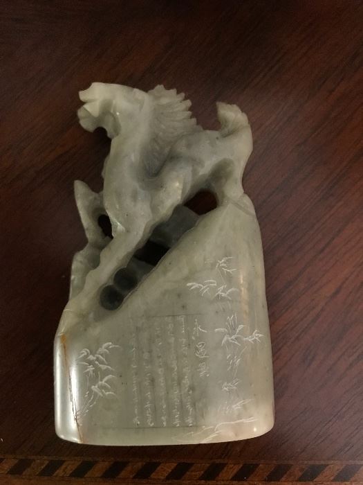 Jade carving of two horses with engraved writing