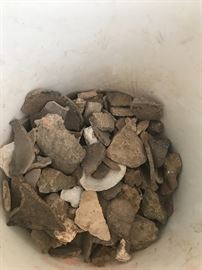 Bucket of stone tools. Not in great shape but interesting