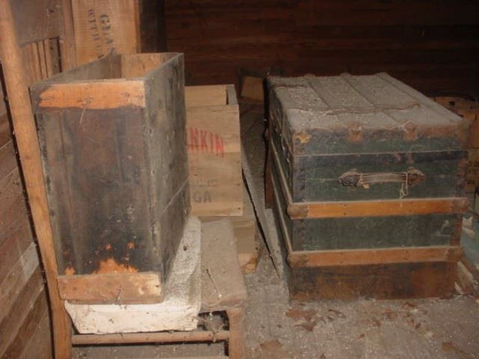 many old trunks, wooden boxes, shipping crates and more