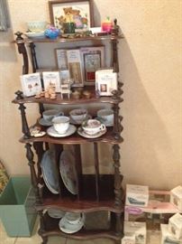 Small antique music stand with brass casters